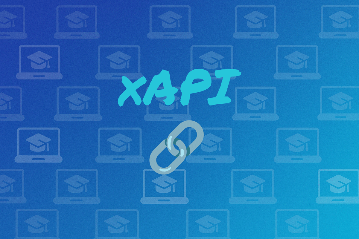 The text: xAPI on a colorful image with a pattern of laptops
